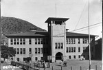 Central School, circa 1908. Note the basketball court and the children playing outside. Photograph by Gehm.