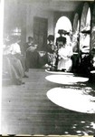 Women sitting on a porch at the original Young Women's Christian Association, YWCA, in Bisbee.