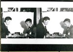A view for a steroptican, or stereograph, of two men playing chess. Possibly taken in Bisbee, circa 1916.