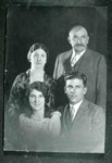 Family portrait of the Milutinovich family, circa early 1920s. Front left to right: children Edith and Robert (Buck). Back left to right: parents Katie and Dave.