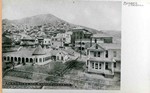 Photograph postcard showing the Williams-Douglas House, which later became the YWCA, the Bessemer House, the gymnasium, and other buildings up the hill behind them. Photo by Humphries Photo Company, circa 1904, published in El Paso, Texas. Photo captioned: Residences and Bisbee Gymnasium.