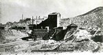 Photograph postcard showing the Spray Shaft of the Copper Queen Mine, circa 1904. The Irish Mag is in the background. Photo captioned: Spray Shaft, Copper Queen Mines. Photo by Humphries and published in El Paso, Texas.