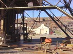 Shops and buildings as seen through the Junction headframe. Photo taken April 2004. Wittig Once Upon a Mine collection.